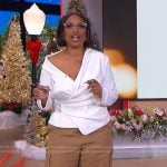 Jennifer’s white asymmetric top and cargo pants on The Jennifer Hudson Show