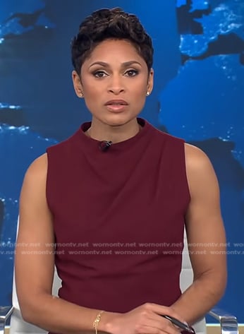 Jericka's maroon sleeveless jumpsuit on CBS Evening News