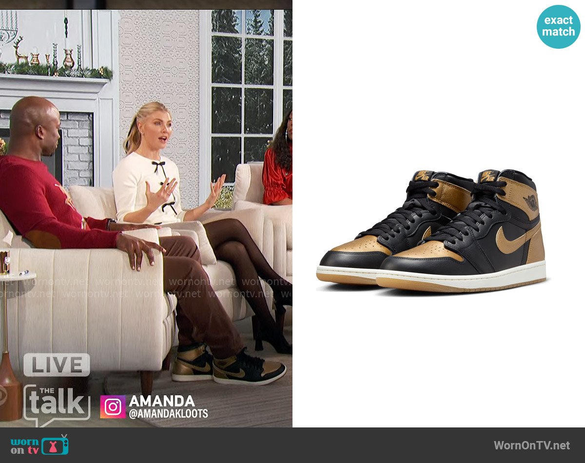 Akbar’s black and gold sneakers on The Talk