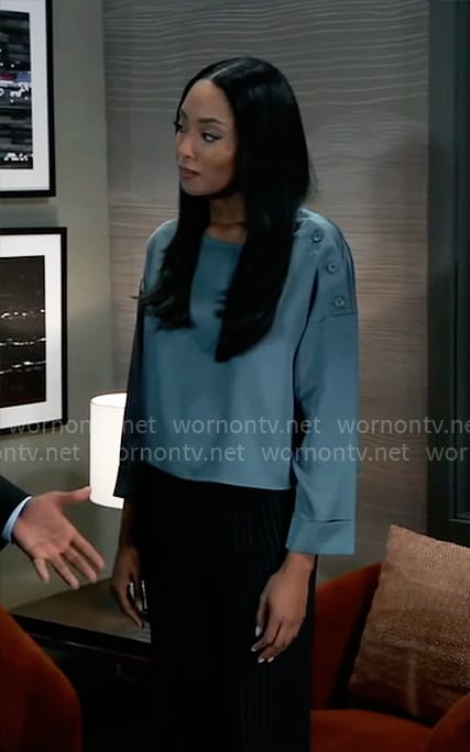 Jordan’s blue buttoned shoulder top on General Hospital