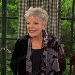 Julie’s black and grey print velvet jacket on Days of our Lives