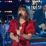 Kelly’s red embellished puff sleeve dress on The Kelly Clarkson Show