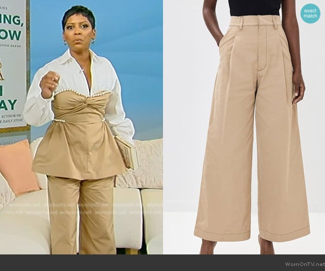 Tamron’s khaki pants on Tamron Hall Show