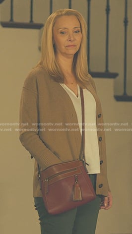 Lydia’s beige cardigan and red leather shoulder bag on No Good Deed