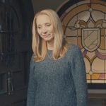 Lydia’s gray pointelle knit sweater on No Good Deed