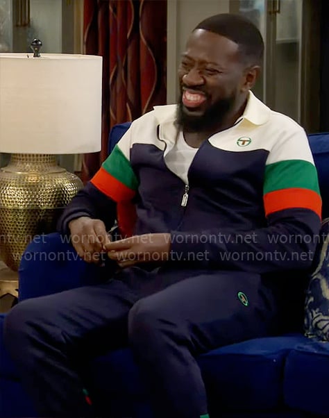 Malcolm's colorblock tracksuit on The Neighborhood