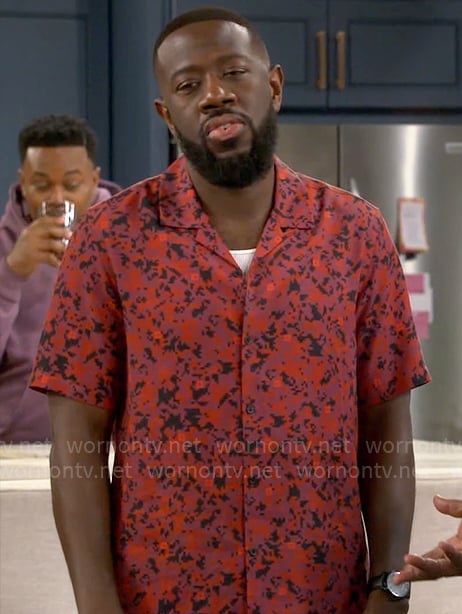 Malcolm's red printed shirt on The Neighborhood