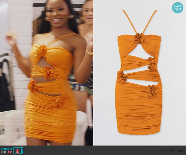 Keiarna’s orange cutouts mini dress on RHOP