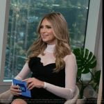 Nikki Novak’s black floral applique dress on E! News