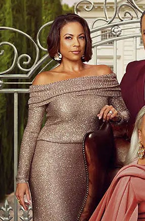 Nicole's metallic off-shoulder sweater and skirt set on Beyond the Gates