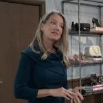 Nina’s dark green dress with foldover neckline on General Hospital