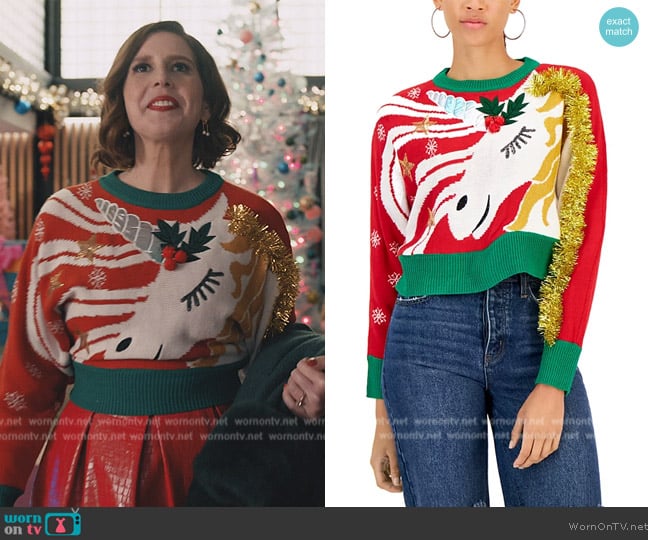 Planet Gold Unicorn Christmas Tinsel-Embellished Sweater worn by Deedee (Vanessa Bayer) on Elsbeth