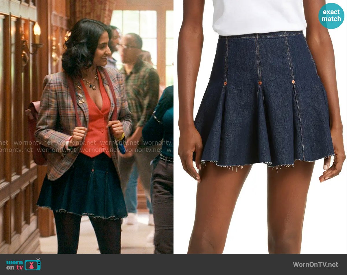 Re/Done Pleated denim cotton blend mini skirt worn by Bela Malhotra (Amrit Kaur) on The Sex Lives of College Girls