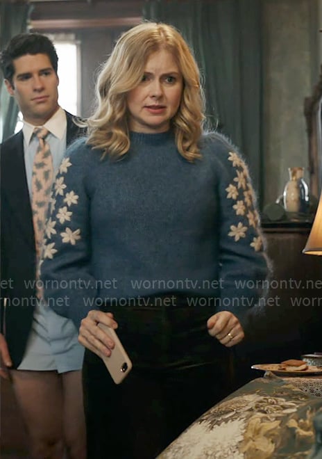 Sam's blue sweater with floral sleeves on Ghosts