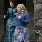 Sam’s blue sweater and floral midi skirt on Ghosts