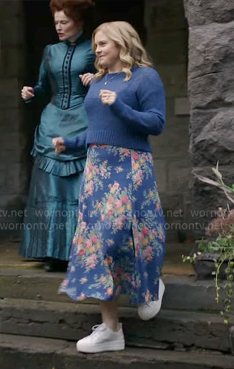 Sam's blue sweater and floral midi skirt on Ghosts