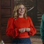 Sam’s red sweatshirt and blue tweed skirt on Ghosts