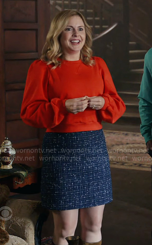 Sam’s red sweatshirt and blue tweed skirt on Ghosts