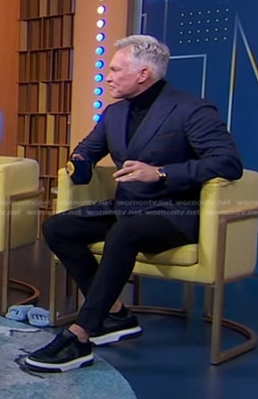 Sam Champion’s black sneakers on Good Morning America