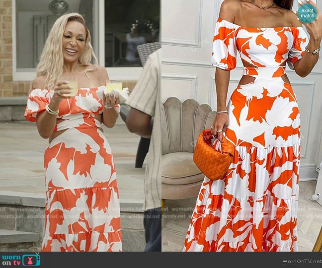 Karen’s white and orange printed cutout dress on RHOP