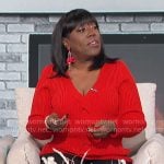 Sheryl’s red v-neck cable front sweater on The Talk