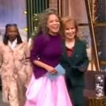 Sunny’s purple mixed media dress on The View