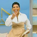 Tamron’s khaki pearl trim top and pants on Tamron Hall Show