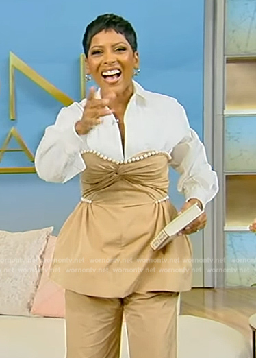 Tamron's khaki pearl trim top and pants on Tamron Hall Show