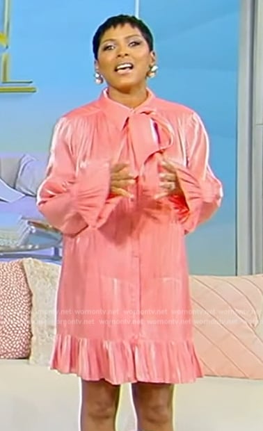 Tamron’s pink satin tie neck mini dress on Tamron Hall Show