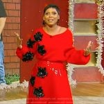 Tamron’s red floral embellished sweater and skirt on Tamron Hall Show