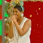 Tamron’s white deep v-neck mini dress on Tamron Hall Show