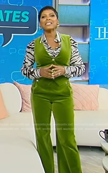 Tamron’s green velvet vest and pants on Tamron Hall Show