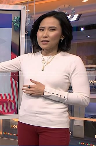 Vicky's white button cuff sweater on NBC News Daily