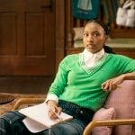 Whitney’s green v-neck sweater and cargo jeans on The Sex Lives of College Girls