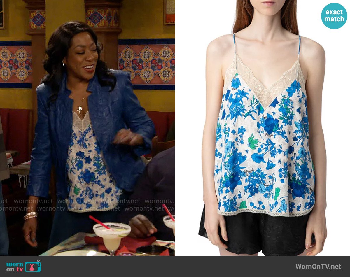 Tina’s blue floral cami on The Neighborhood