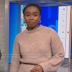 Zinhle’s beige asymmetric sweater on NBC News Daily