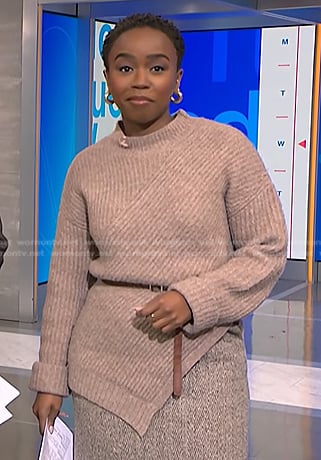 Zinhle’s beige asymmetric sweater on NBC News Daily