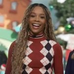 Zuri’s red argyle sweater on Access Hollywood