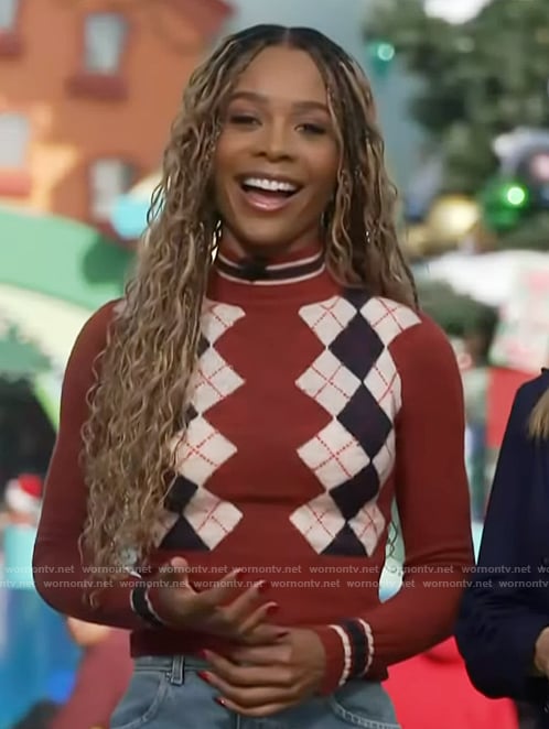 Zuri’s red argyle sweater on Access Hollywood