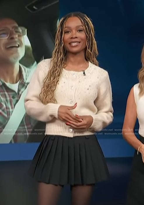 Zuri's embellished beige cardigan on Access Hollywood