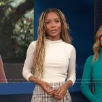 Zuri’s plaid mini skirt on Access Hollywood