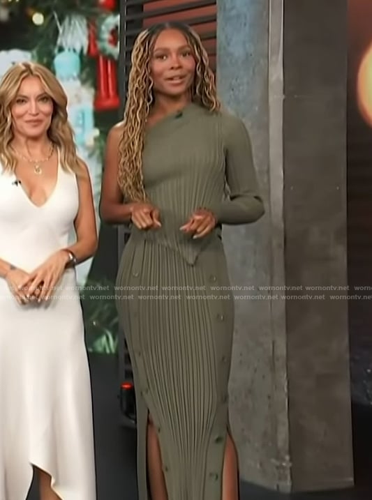 Zuri’s green one sleeve asymmetric top and skirt on Access Hollywood