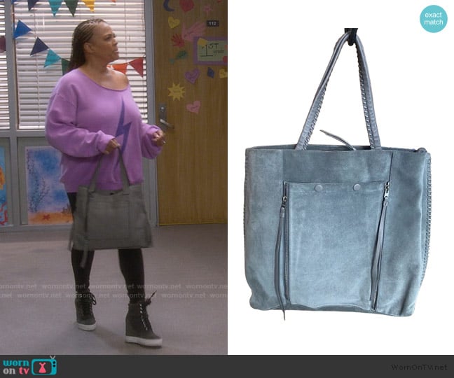 All Saints Fleur De Lis Tote Bag worn by Regina Upshaw (Kim Fields) on The Upshaws