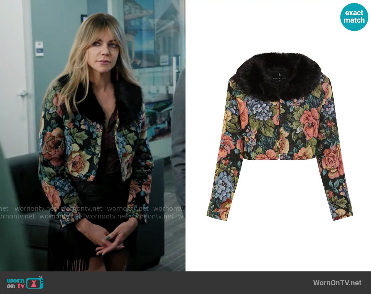 Unreal Fur Monarch floral-print cropped jacket worn by Morgan Gillory (Kaitlin Olson) on High Potential