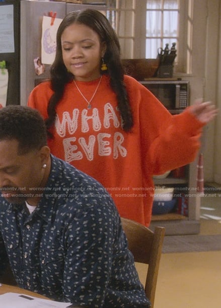 Aaliya's red what ever print sweater on The Upshaws