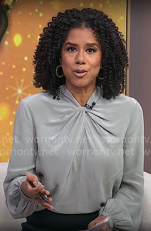 Adriana Diaz's sage green twist-neck blouse on CBS Mornings