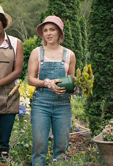 Alice’s denim overalls and pink corduroy bucket hat on Grosse Pointe Garden Society