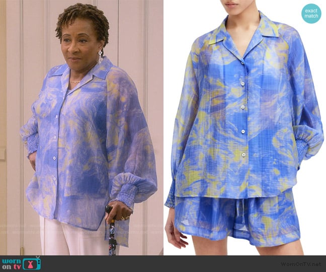 Lucretia’s blue floral print blouse on The Upshaws