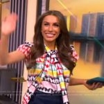 Alyssa’s butterfly print tie neck top on The View