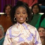 Amber Ruffin’s purple floral print blouse on The Kelly Clarkson Show